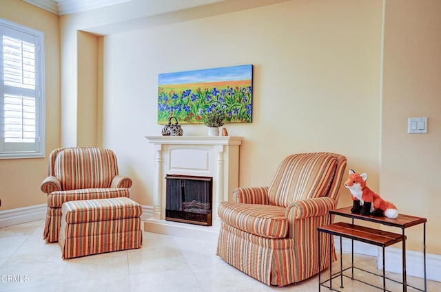 living area featuring light tile patterned floors and crown molding