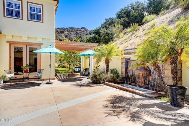 view of patio / terrace with a pergola