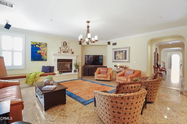 living room with ornamental molding and an inviting chandelier