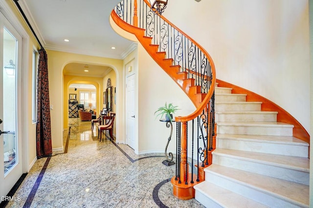 stairs with crown molding