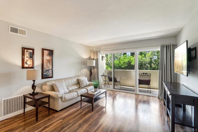 living room with dark wood-type flooring