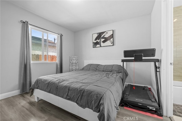 bedroom featuring hardwood / wood-style floors