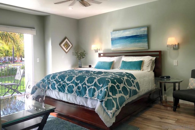 bedroom featuring ceiling fan and hardwood / wood-style floors