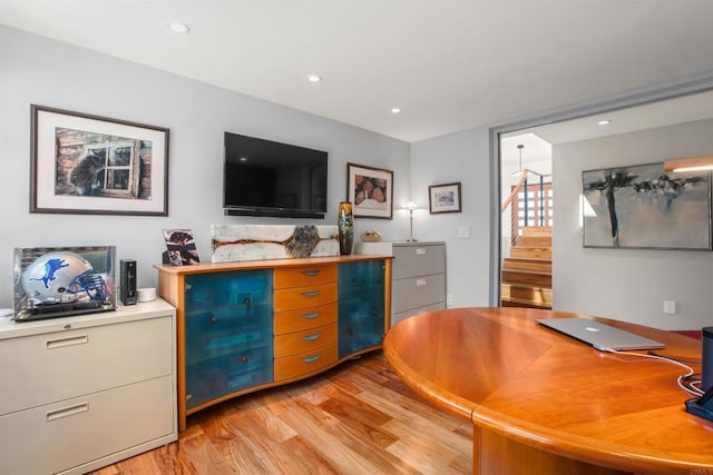 office area with light hardwood / wood-style flooring