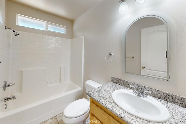 full bathroom with shower / bathing tub combination, toilet, vanity, and tile patterned flooring