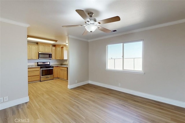 kitchen featuring light hardwood / wood-style floors, ceiling fan, appliances with stainless steel finishes, light brown cabinets, and ornamental molding