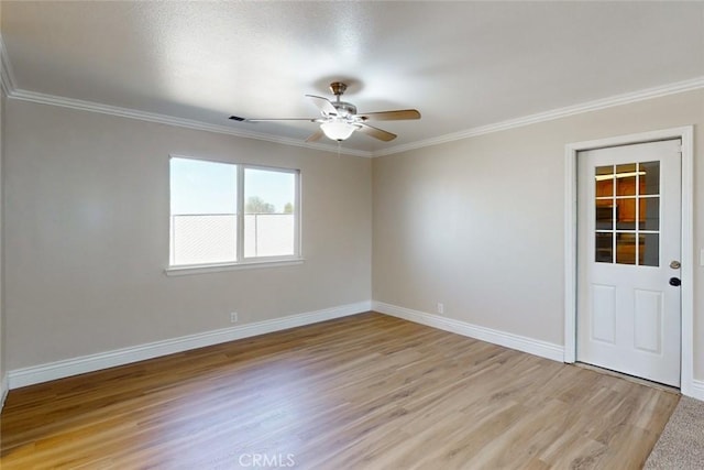 unfurnished room with ceiling fan, ornamental molding, and light hardwood / wood-style flooring