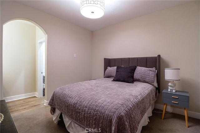 bedroom with light wood-type flooring