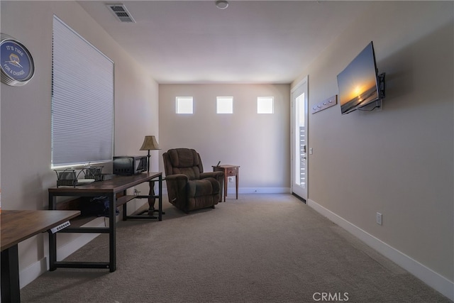 interior space featuring light colored carpet