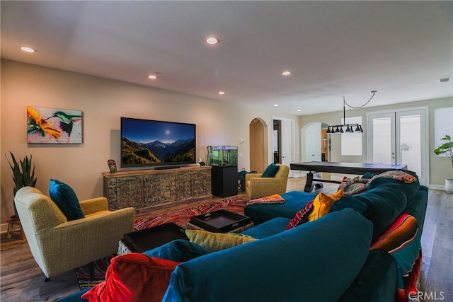 living room featuring hardwood / wood-style floors and french doors