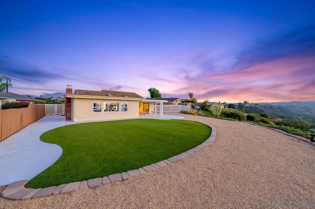 exterior space with a lawn