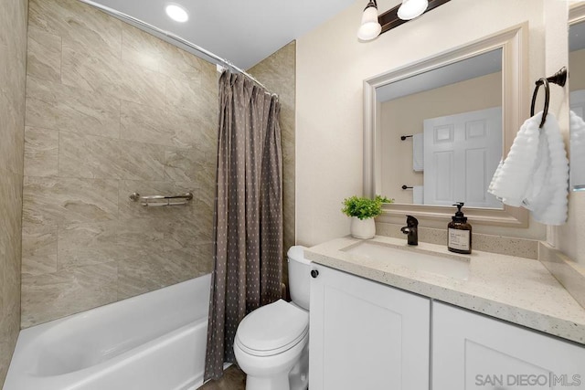 full bathroom featuring vanity, toilet, and shower / bath combo