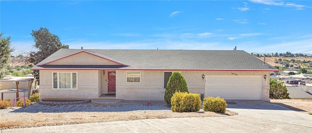 single story home with a garage