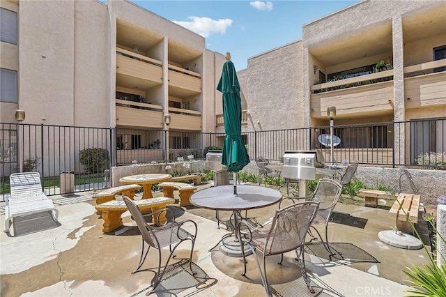 view of patio with a balcony