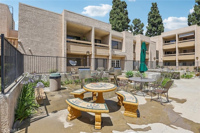 view of patio with a balcony