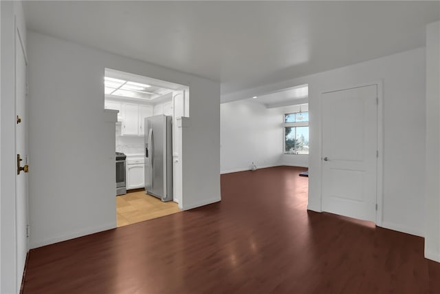 unfurnished living room featuring light wood-type flooring