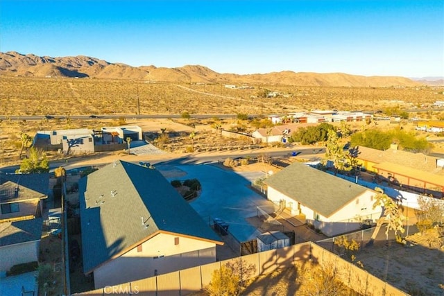 birds eye view of property featuring a mountain view