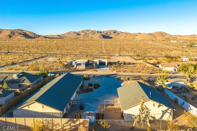 birds eye view of property featuring a mountain view