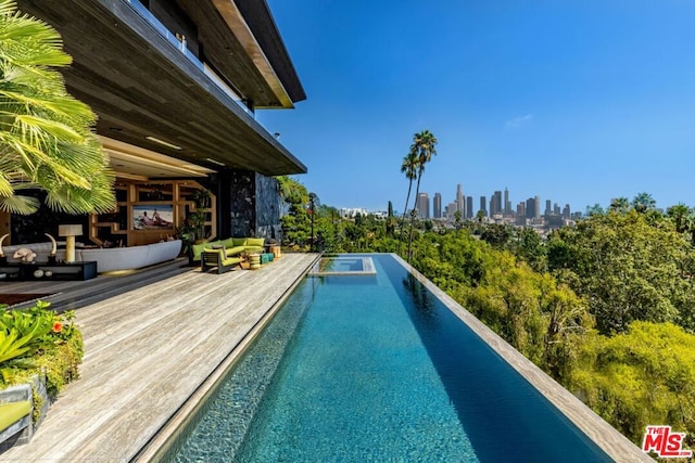 view of pool with a deck