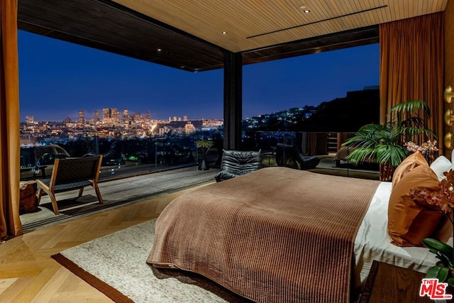 bedroom featuring parquet flooring and wooden ceiling