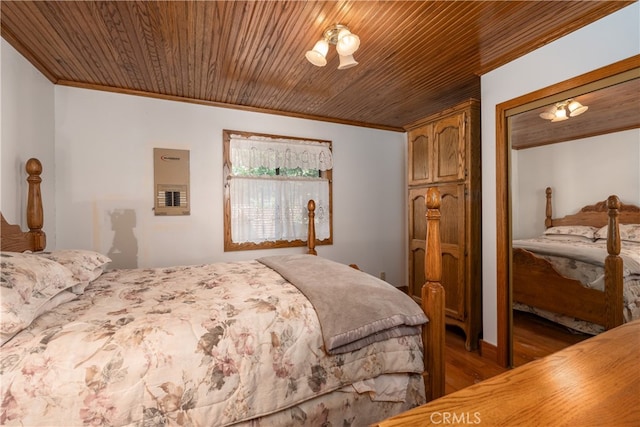 7226 Yosemite Park Way, Yosemite, CA 95389 - bedroom featuring wood ceiling, light wood-type flooring, and ornamental molding