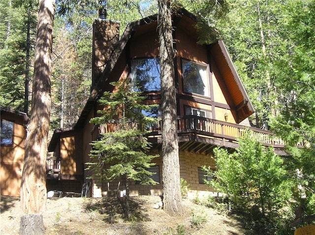 7226 Yosemite Park Way, Yosemite, CA 95389 - view of side of property featuring a wooden deck