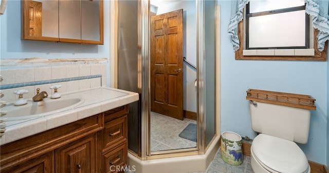 7226 Yosemite Park Way, Yosemite, CA 95389 - bathroom featuring vanity, toilet, and an enclosed shower
