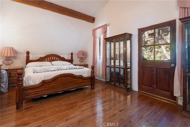 7226 Yosemite Park Way, Yosemite, CA 95389 - bedroom featuring vaulted ceiling with beams and dark hardwood / wood-style floors