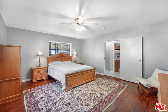 bedroom with ceiling fan and dark wood-type flooring