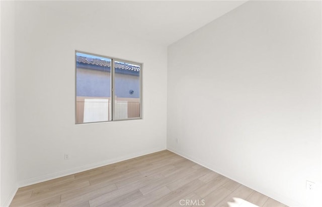 unfurnished room featuring light wood-type flooring