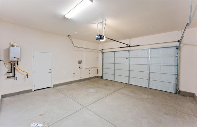 garage featuring a garage door opener and water heater