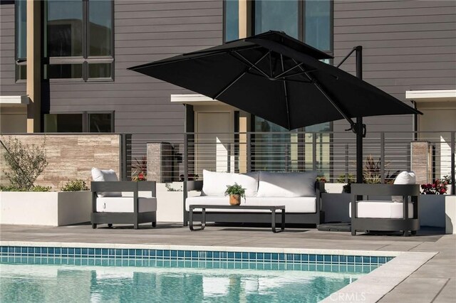 380 Cordova St Unit 506, Pasadena, CA 91101 - view of swimming pool featuring an outdoor hangout area and a patio