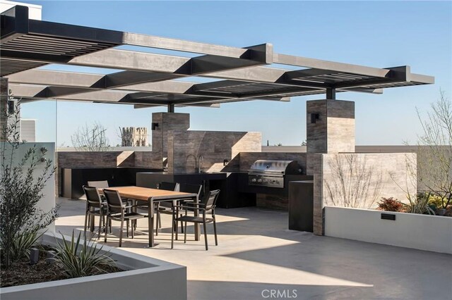 380 Cordova St Unit 506, Pasadena, CA 91101 - view of patio with outdoor dining area and a sink