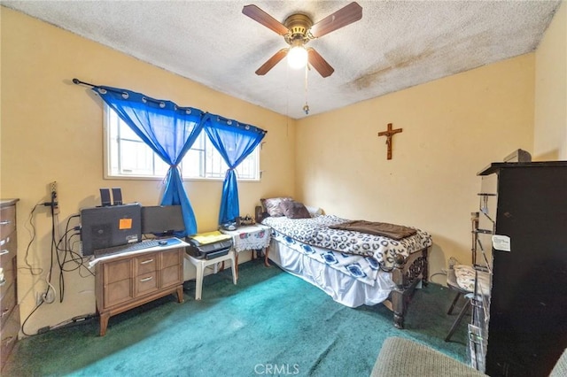 bedroom with carpet flooring, ceiling fan, and a textured ceiling