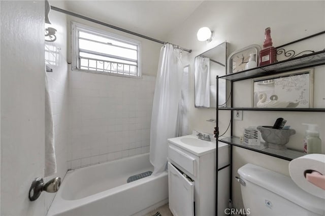 full bathroom with toilet, vanity, and shower / tub combo with curtain