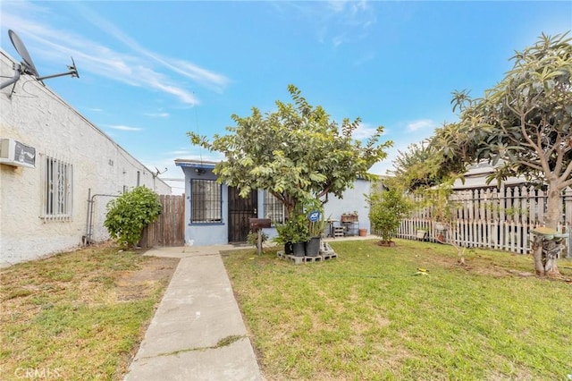 view of front of home featuring a front lawn