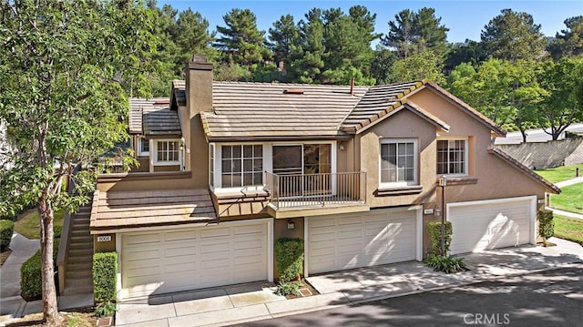 view of front of house with a balcony