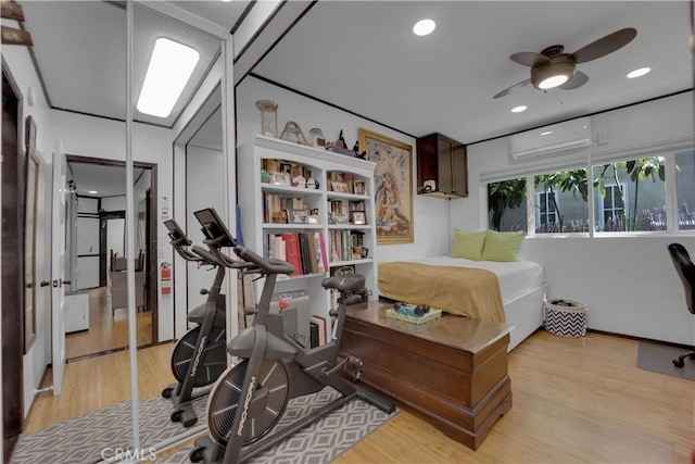 4140 Baldwin Ave Unit A, Culver City, CA 90232 - bedroom featuring light wood-type flooring, a wall mounted air conditioner, and recessed lighting