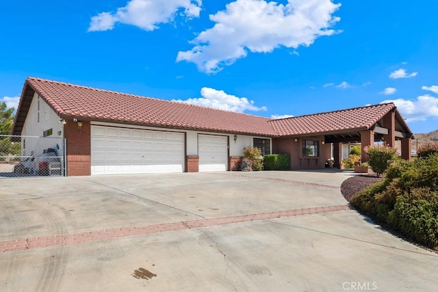 ranch-style home with a garage