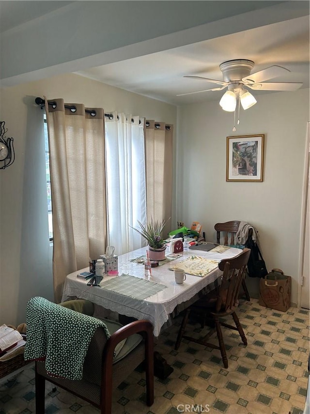 dining space with ceiling fan