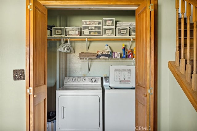 washroom featuring washer and dryer