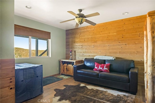 30008 Hickory Dr, Lake Arrowhead, CA 92321 - living area with wooden walls, wood finished floors, a ceiling fan, and recessed lighting