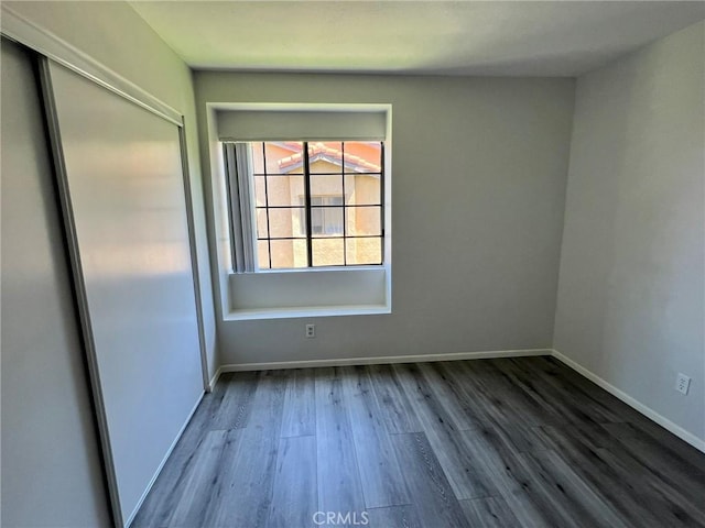 empty room featuring hardwood / wood-style floors