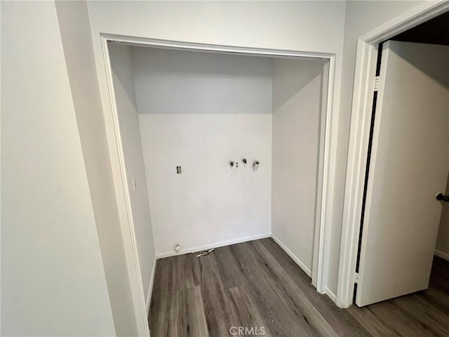 laundry room with dark hardwood / wood-style floors