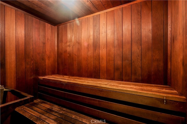 view of sauna with wooden ceiling