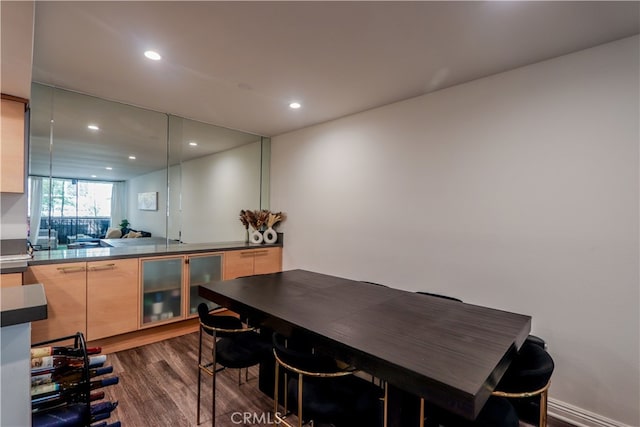 dining room with dark wood-type flooring