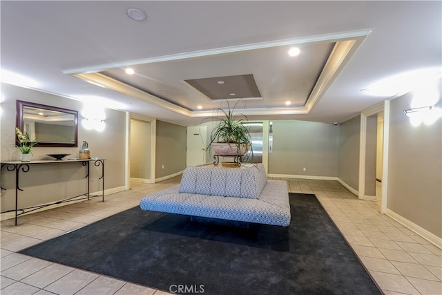 bedroom featuring a raised ceiling and light tile patterned flooring