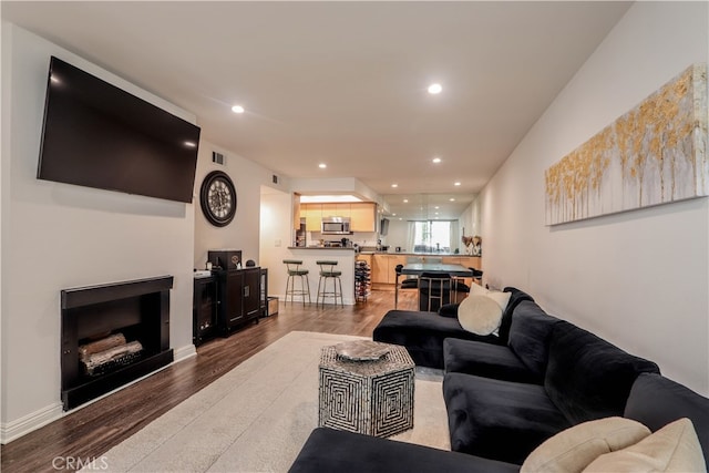 living room featuring hardwood / wood-style flooring