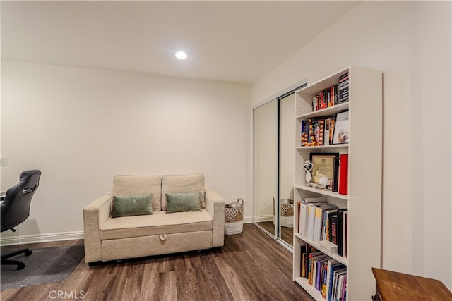 living area featuring hardwood / wood-style flooring