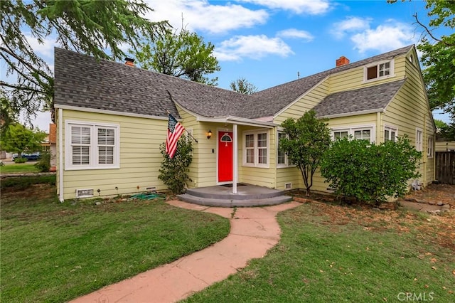 view of front of property with a front yard